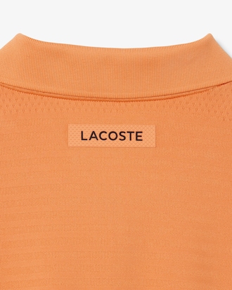 Polo de tenis de jacquard el&aacute;stico Ultra-Dry