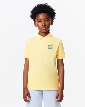 Polo Lacoste × Club Med de piqué con insignia