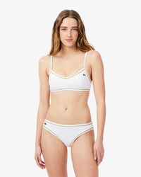 Top de bikini con ribetes en contraste