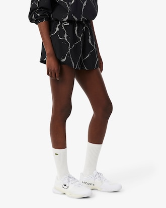 Pantal&oacute;n corto de tenis forrado con estampado reflectante