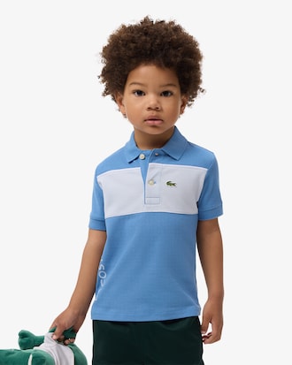 Polo de petit piqu&eacute; con bloques de color