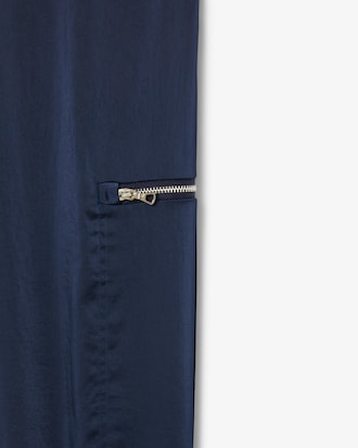 Pantalón vaporoso con bolsillos con cremallera