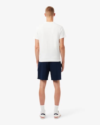 Pantal&oacute;n corto de tenis cl&aacute;sico con insignia decorativa Ultra Dry