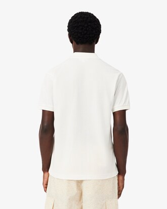 Polo de corte cl&aacute;sico con detalles de marca gr&aacute;ficos