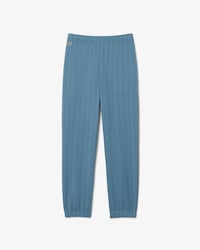 Pantal&oacute;n de ch&aacute;ndal con monograma