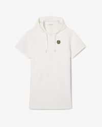 Vestido de piqu&eacute; con capucha