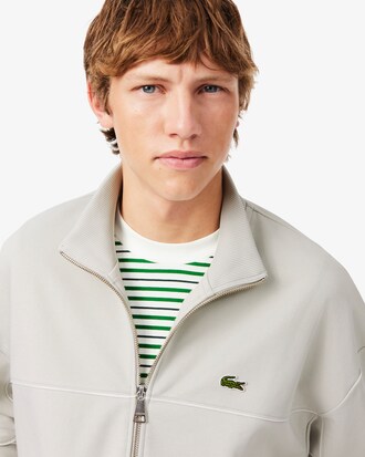 Sudadera con cremallera y ribete en contraste