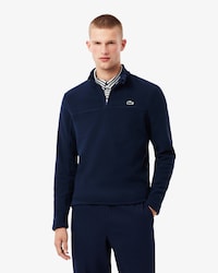 Top de golf con cremallera corta de forro polar