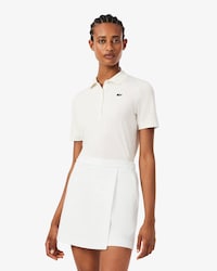 Polo de golf el&aacute;stico de corte ajustado con protecci&oacute;n UV