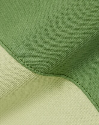 Sudadera con capucha y cremallera con bloques de color