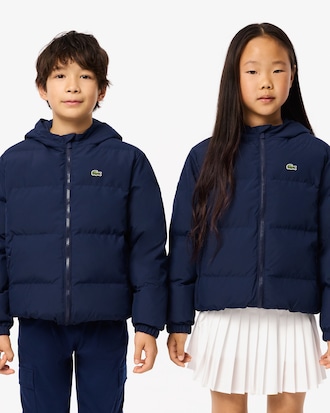 Chaqueta acolchada con capucha y cocodrilo bordado