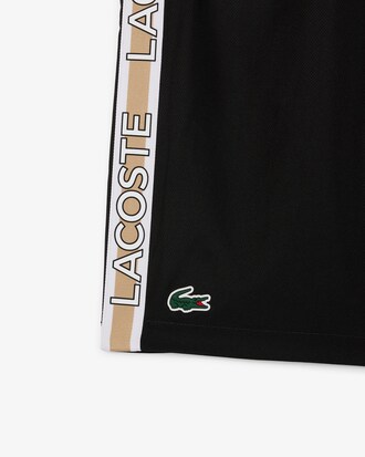 Pantalón corto de rayas con logotipo deportivo