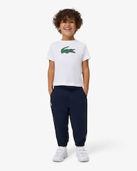 Pantal&oacute;n de ch&aacute;ndal deportivo hidr&oacute;fugo