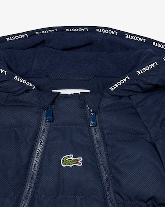 Mameluco con capucha de bebé de tafetán