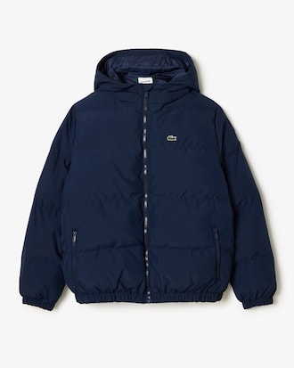 Chaqueta acolchada con capucha y cocodrilo bordado