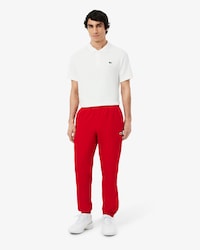 Pantal&oacute;n de ch&aacute;ndal deportivo hidr&oacute;fugo