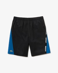 Pantal&oacute;n corto de hombre Lacoste SPORT bicolor con franjas distintivas
