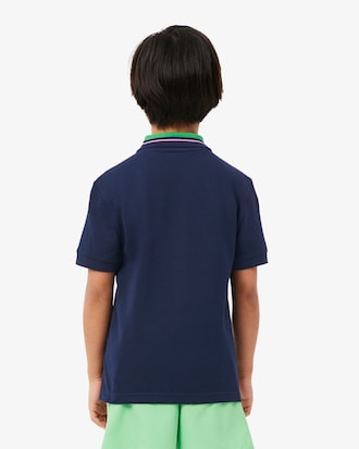 Polo de petit piqué con cuello de rayas
