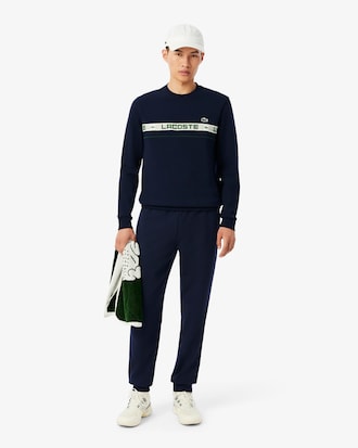 Sudadera de tenis de rayas con detalles de marca