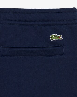 Pantal&oacute;n de ch&aacute;ndal con detalles de marca estampados en relieve