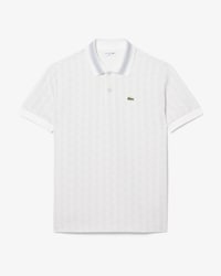 Polo de jacquard de corte cl&aacute;sico con monograma