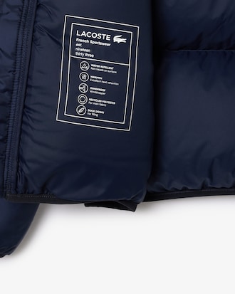 Chaqueta acolchada corta con capucha hidrófuga