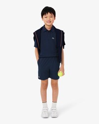 Pantal&oacute;n corto deportivo de tafet&aacute;n de rombos