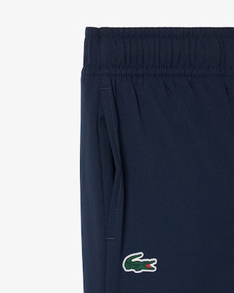 Pantal&oacute;n de ch&aacute;ndal deportivo hidr&oacute;fugo