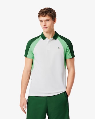 Polo deportivo con estampado y bloques de color
