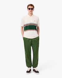 Pantal&oacute;n de ch&aacute;ndal con monograma