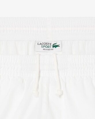 Pantal&oacute;n corto de tenis ligero de rayas con bloques de color