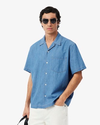 Camisa vaquera de cuello abierto y corte holgado