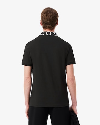 Polo de corte ajustado con detalles de marca en jacquard