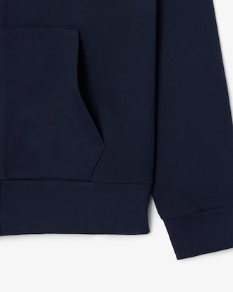 Sudadera con capucha y cremallera color block