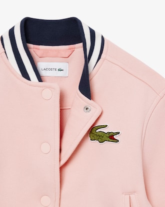 Cazadora tipo bomber de felpa con insignia bordada