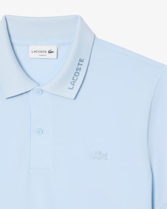 Polo Commuter de piqu&eacute; de corte ajustado con detalles de marca de jacquard