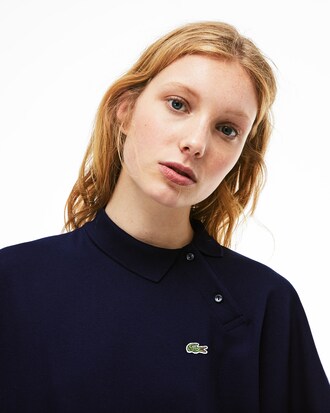 Polo minipiqu&eacute; el&aacute;stico manga kimono y cuello desestructurado