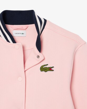 Cazadora tipo bomber de felpa con insignia bordada