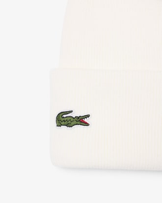 Bonnet laine m&eacute;lang&eacute;e avec badge