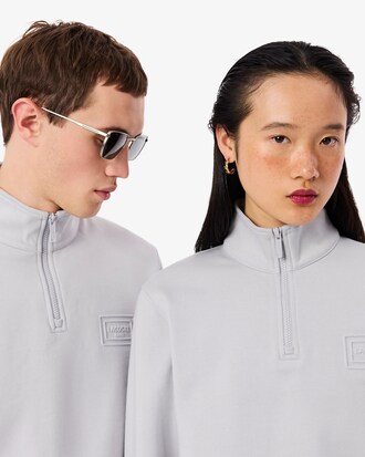 Sweatshirt col montant zipp&eacute; marquage emboss&eacute;