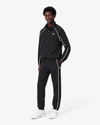 Pantalon de surv&ecirc;tement Sport d&eacute;perlant liser&eacute;s