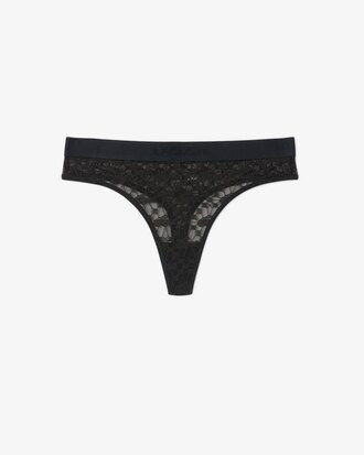 String en dentelle avec ceinture siglée