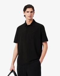 Polo loose fit en mesh