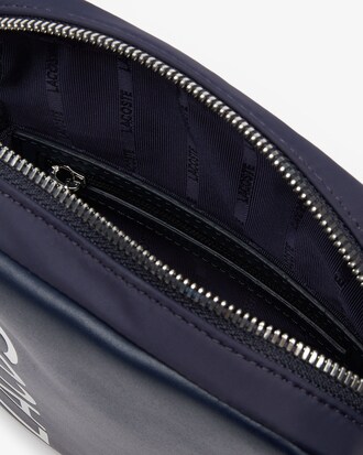 Sacoche verticale L.12.12 Signature en cuir uni