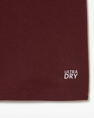 Polo Tennis slim fit sans manche Ultra Dry