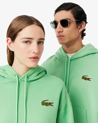 Sweatshirt à capuche loose fit avec badge