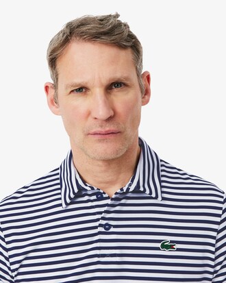 Polo Golf regular fit Ultra Dry ray&eacute;
