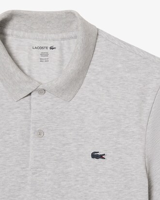Polo regular fit en coton m&eacute;lang&eacute;