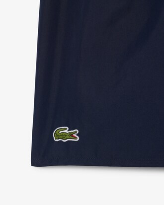 Short de bain mi-long uni