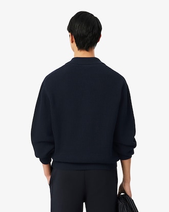 Pull col polo maille perl&eacute;e badge